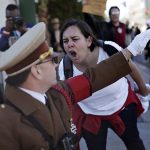 #38 A Woman Yells At A Man Dressed As Adolf Hitler During A Protest Of Newly Inaugurated President Donald Trump At A Women’s March Saturday, Las Vegas, 21 January 2017