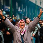 #51 A Woman Protester Waves The Victory Sign During Clashes With Military Police Near Tahrir Square, 17 January 2013